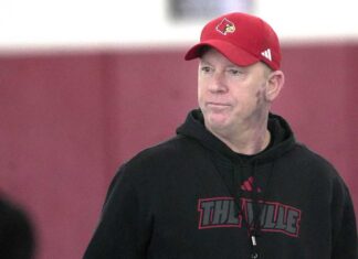 Louisville’s Jeff Brohm defends the ACC